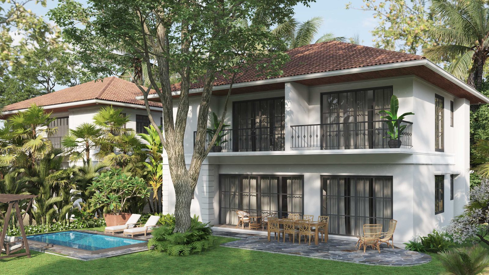 A villa with a garden pool among palms in Benaulim, South Goa